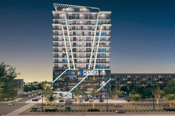 Front view of Bahria Sky 2 high-rise building in Bahria Orchard Phase 4, featuring modern architecture with luxury apartments, commercial outlets, and illuminated exterior design at night.