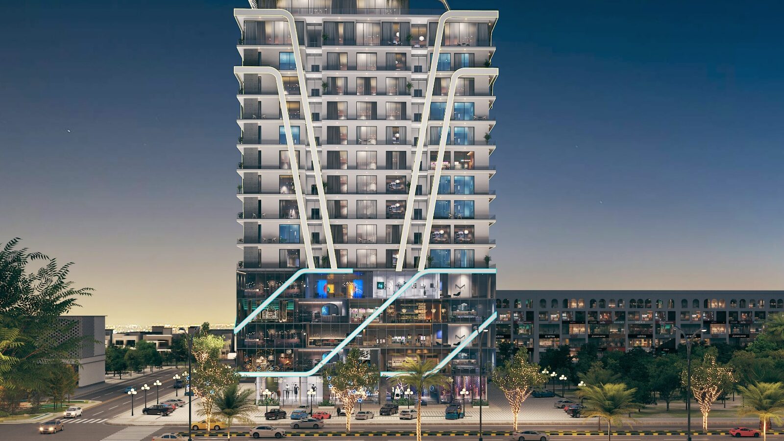 Front view of Bahria Sky 2 high-rise building in Bahria Orchard Phase 4, featuring modern architecture with luxury apartments, commercial outlets, and illuminated exterior design at night.